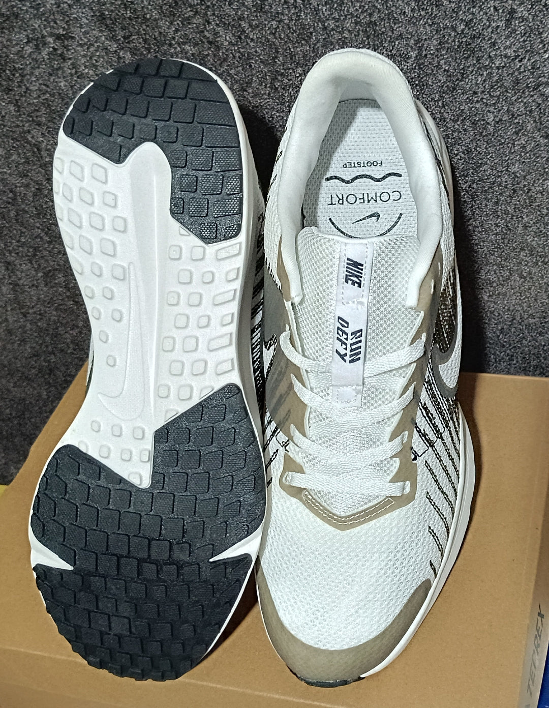 Zapatilla Nike Run Defy Road Gris/blanco